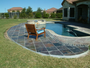 Stone patio around new pool